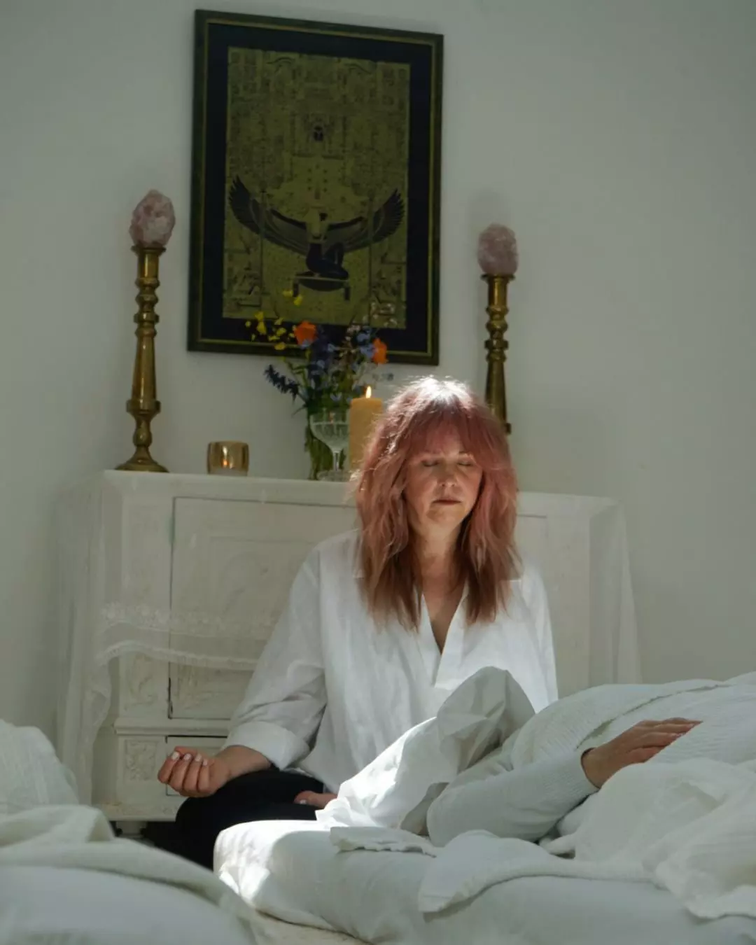 Elle Kerr-Wilson holding a Sacred Vision Healing session in a peaceful healing room in Edmonds, Washington.